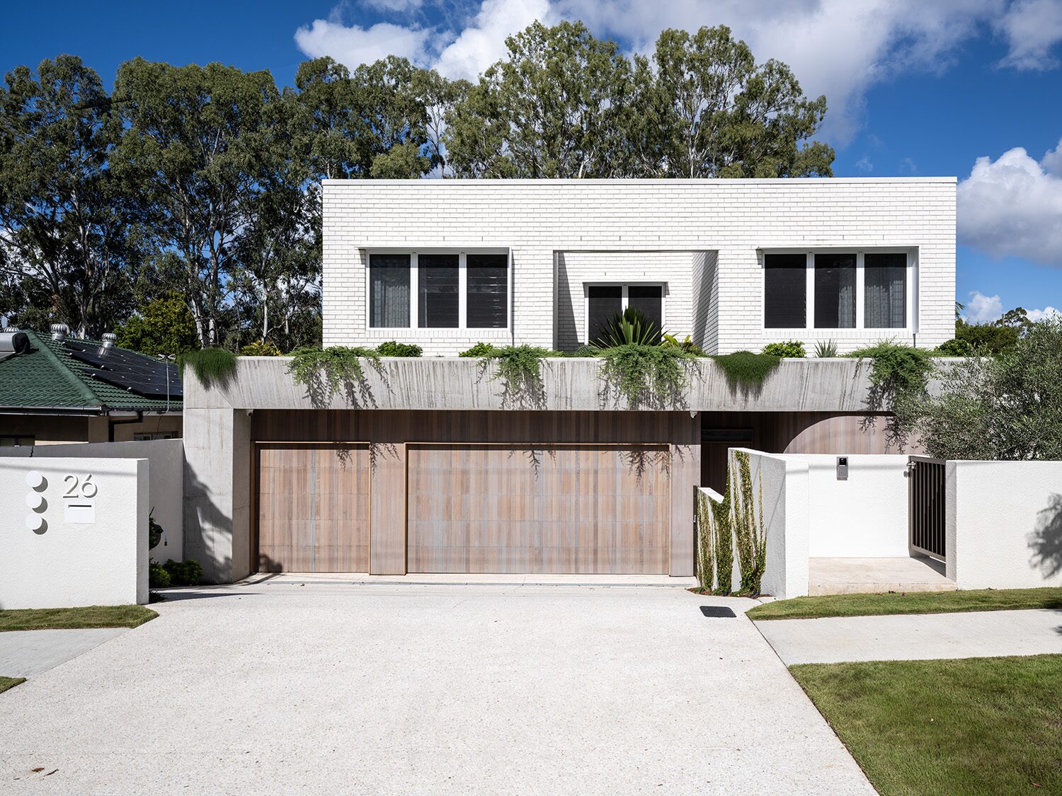 Canopus 2.0, front facade — designed by Koda Design, built by HNT Builders